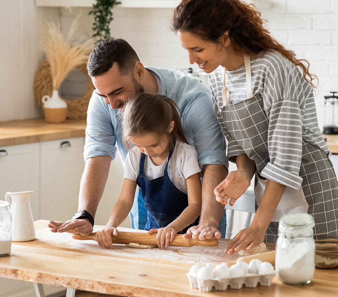 Family baking in kitchen